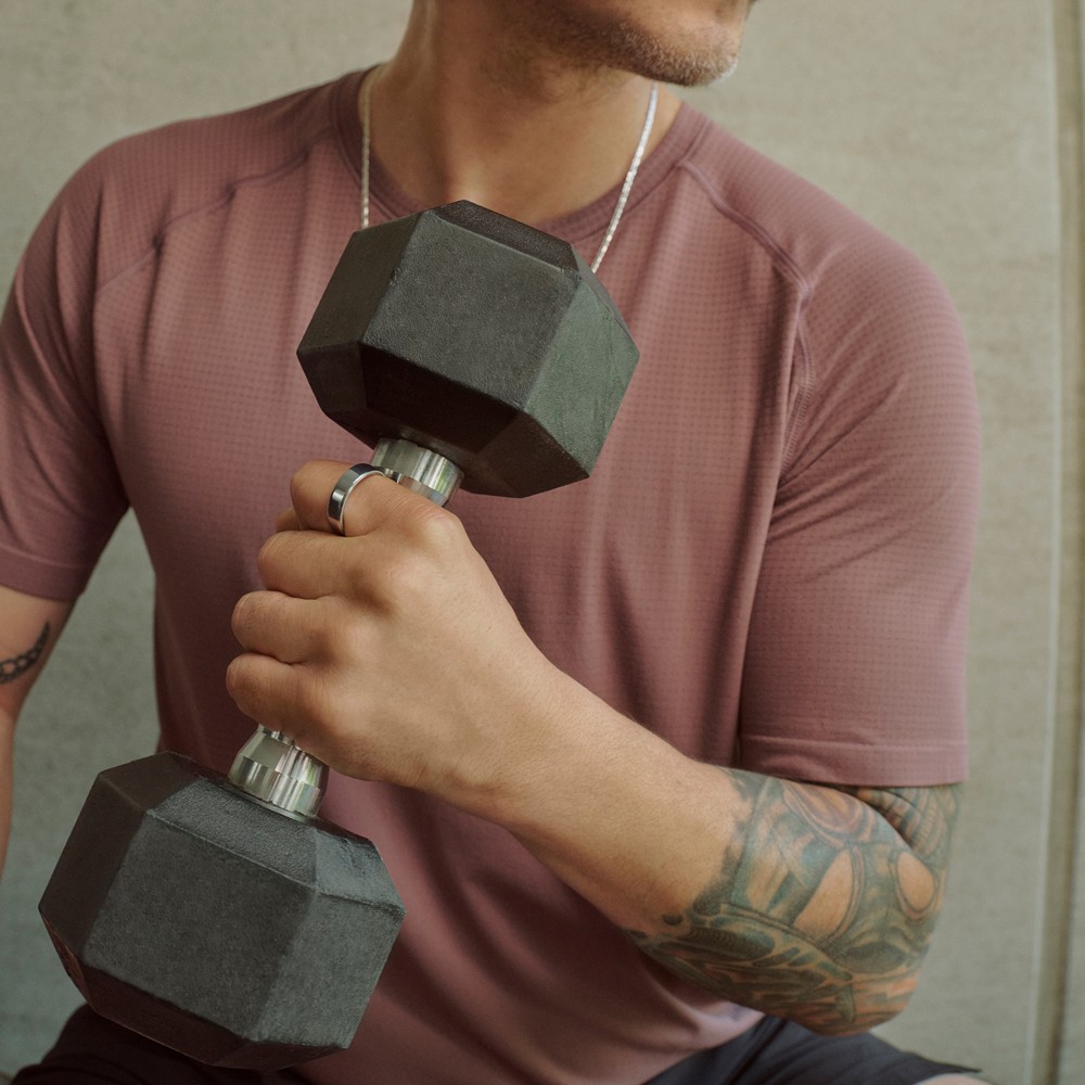 The Oura Ring 5 worn during a strength workout